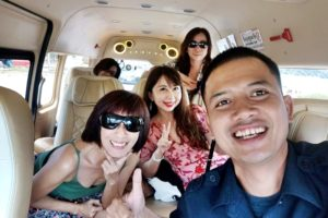 Happy tourists with our driver